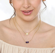 Elegant opal necklace displayed on neutral background
